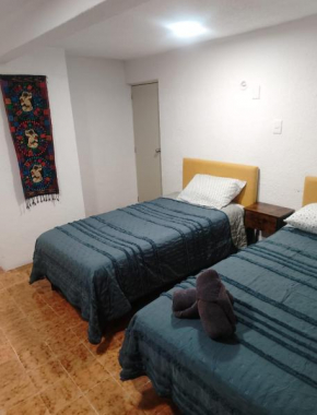 Casa Nance Alojamientos XAMAN HÁ Hospedaje familiar cocineta AC 2 camas baño